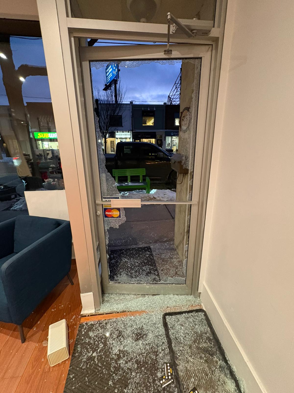 Shattered commercial door glass after break-in - nighttime emergency
