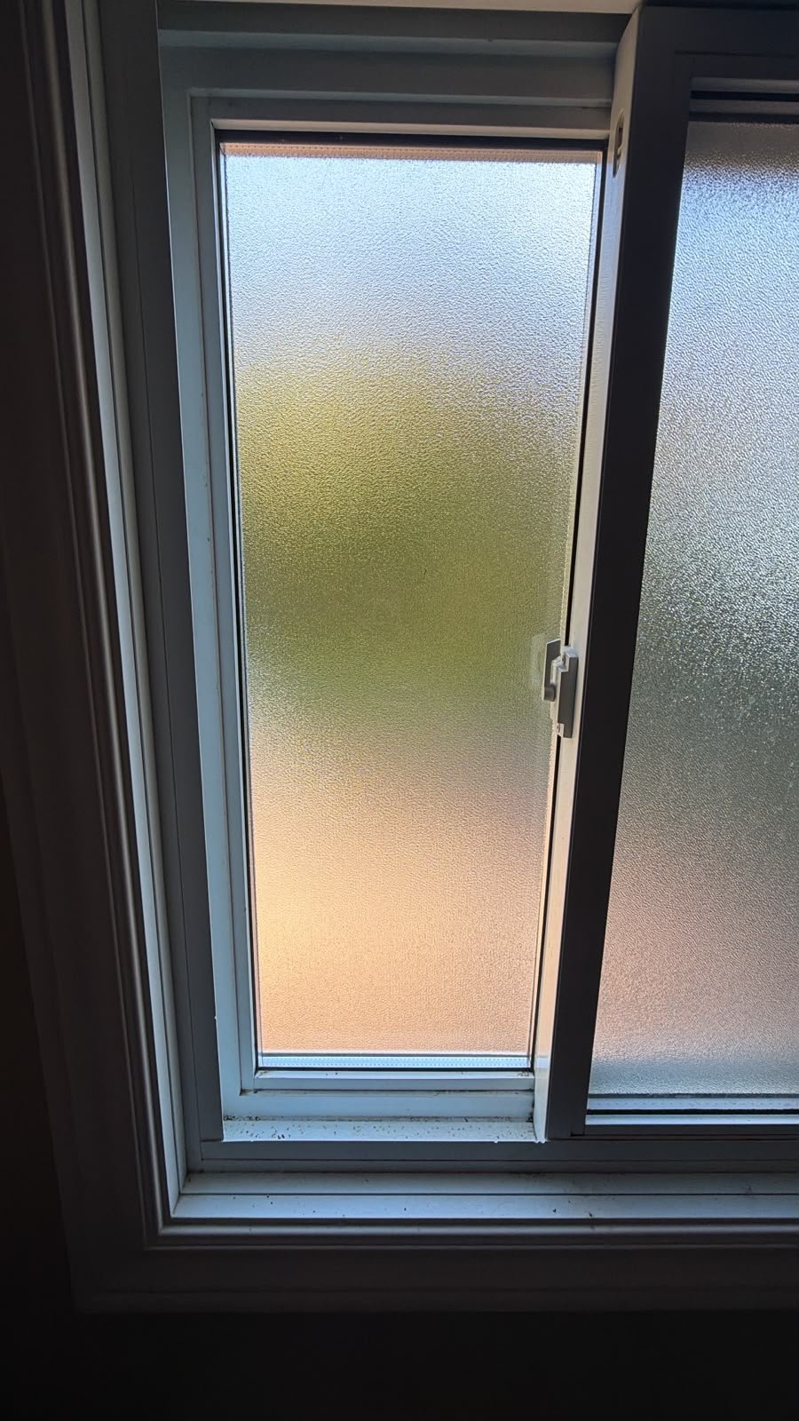 New clean frosted glass sliding window after LuminaSky replacement in Orangeville
