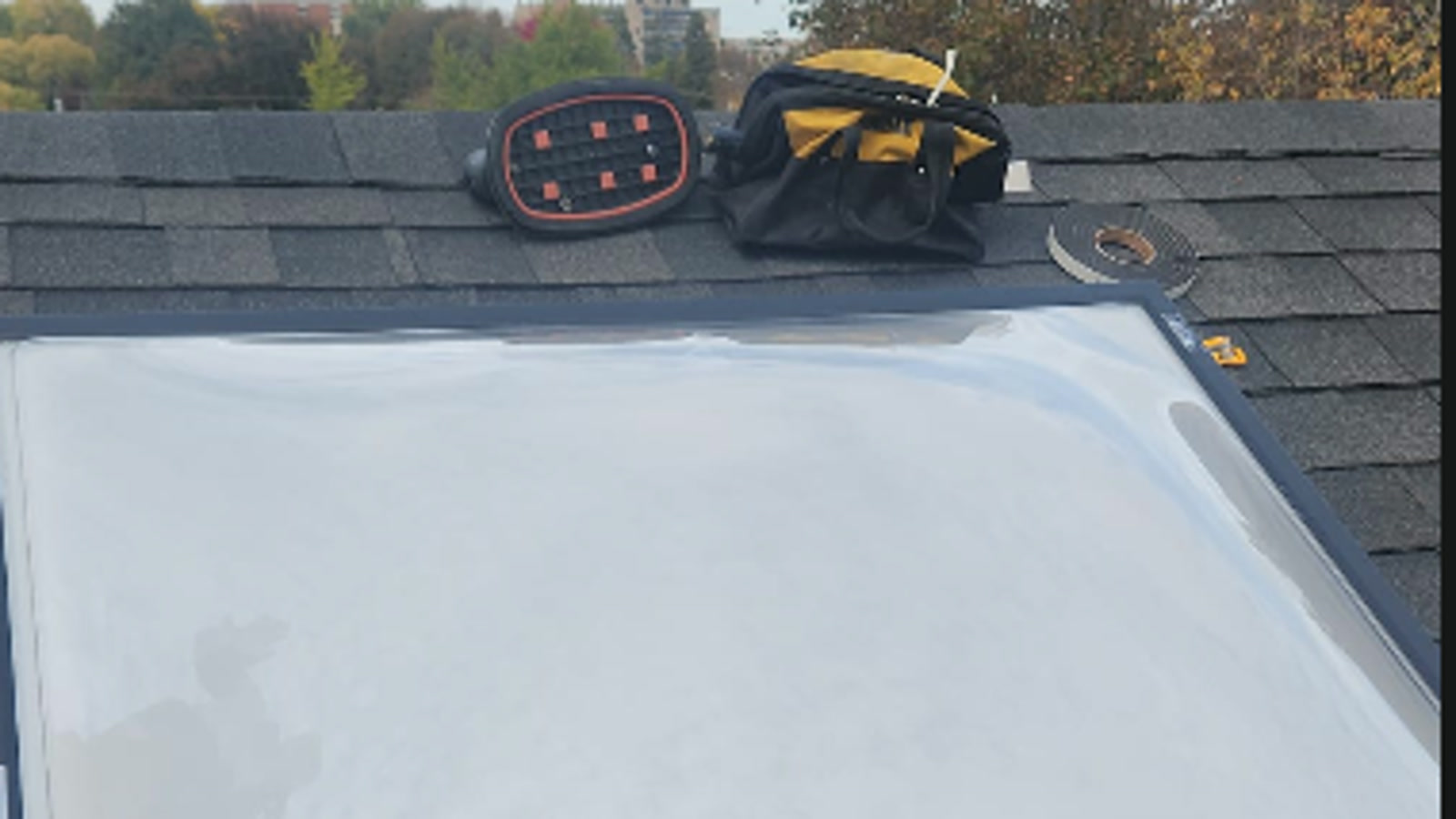 New clear acrylic skylight dome installed on a Richmond Hill roof